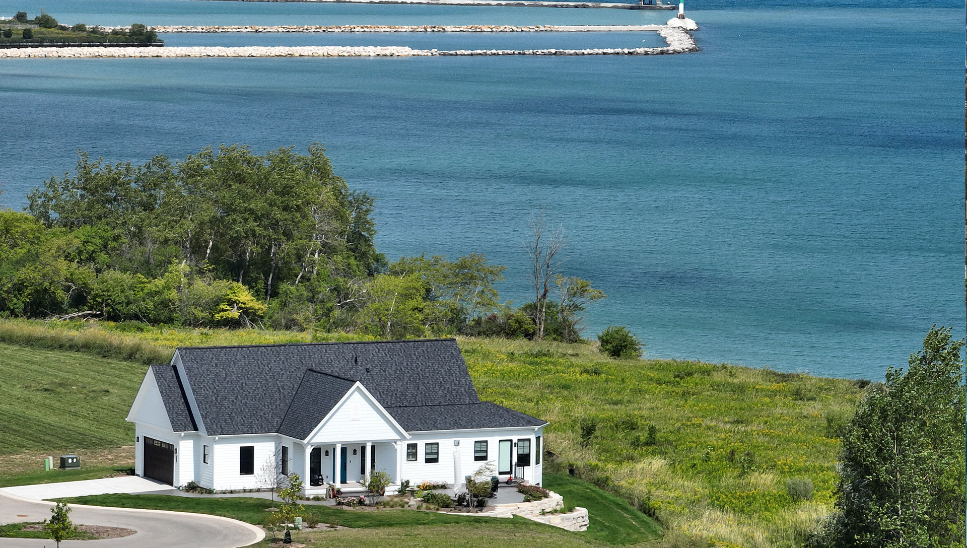 Live your day. Prairie's Edge is a limited collection of unique cottages, townhomes, pocket neighborhood homes, and luxury apartments overlooking Lake Michigan and surrounded by walkways, green spaces and public trails.